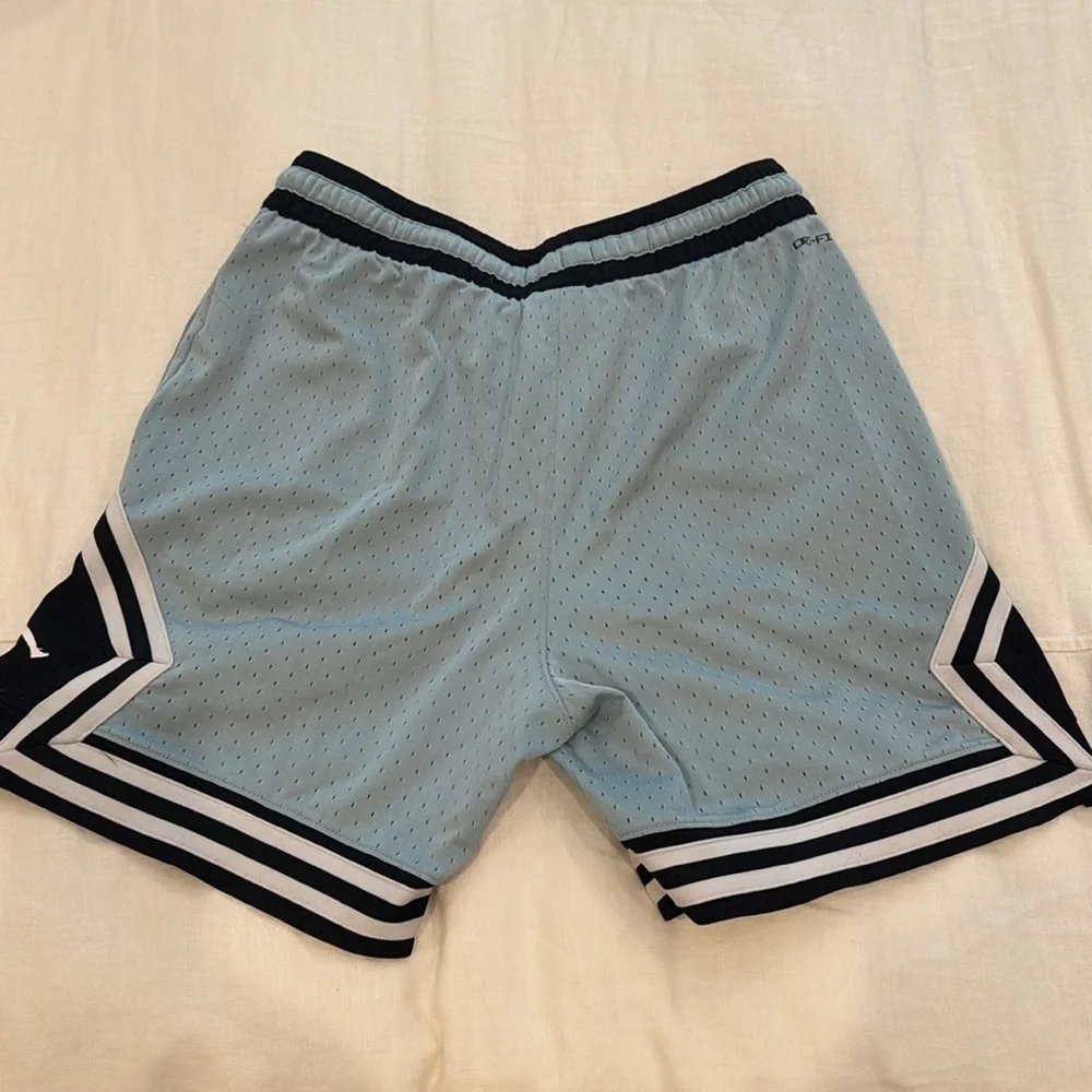 Jordan Men’s Light Blue Mesh Basketball Shorts with Black & White Accents